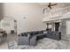 Open-concept living space featuring soaring ceilings, second level views, and neutral color palette at 1834 E Willow Tree Ct, Gilbert, AZ 85234