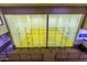 Indoor glass-walled racquetball courts overlook from second story seating area at 1834 E Willow Tree Ct, Gilbert, AZ 85234