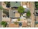 Aerial backyard view featuring a patio set, trampoline, and artificial turf in a well-maintained private outdoor space at 1940 E Indianola E Ave, Phoenix, AZ 85016