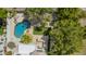 Overhead view of the backyard featuring a pool, patio, outdoor kitchen and luscious landscaping at 1953 W Lark Dr, Chandler, AZ 85286