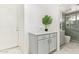 Hallway bathroom featuring a walk in shower, updated vanity and modern design at 1953 W Lark Dr, Chandler, AZ 85286