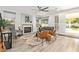 Cozy living room with a fireplace, neutral decor, and access to the backyard patio at 1953 W Lark Dr, Chandler, AZ 85286