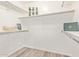 Neutral walk-in closet with spacious shelving and hanging areas at 1953 W Lark Dr, Chandler, AZ 85286