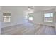 Bright, airy bedroom featuring light-filled windows and light, neutral flooring at 21141 N 79Th Ave, Peoria, AZ 85382