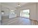 Bright living room with sliding glass doors to the backyard and neutral floors at 21141 N 79Th Ave, Peoria, AZ 85382