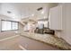 Bright kitchen featuring granite countertops, stainless steel appliances, and tile flooring at 2301 E University Dr # 210, Mesa, AZ 85213