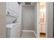 A clean, well-maintained laundry area with a modern washer and dryer unit at 2301 E University Dr # 210, Mesa, AZ 85213
