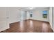 Spacious bedroom with laminate floors, a ceiling fan, and abundant natural light at 23075 W Arrow Dr, Buckeye, AZ 85326