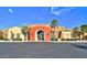 Community Clubhouse features a grand entrance, colorful stucco and a well maintained landscape at 23075 W Arrow Dr, Buckeye, AZ 85326
