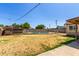 View of the backyard featuring a pool and a chicken coop at 233 E 7Th Dr, Mesa, AZ 85210