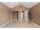 Spacious bedroom featuring tiled floors, closet, and entry door allowing great flow and functionality to the space at 233 E 7Th Dr, Mesa, AZ 85210