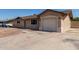 Single-story home featuring an attached garage and a low maintenance front yard at 233 E 7Th Dr, Mesa, AZ 85210