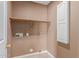 Laundry room with shelving and utility connections at 233 E 7Th Dr, Mesa, AZ 85210