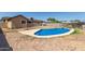 View of the pool in the backyard with brick pavers at 233 E 7Th Dr, Mesa, AZ 85210