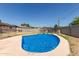 View of the pool in the backyard with a white fence at 233 E 7Th Dr, Mesa, AZ 85210