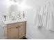 Stylish bathroom features shiplap walls, quartz counters, and brushed gold accents at 2337 E Contessa St, Mesa, AZ 85213