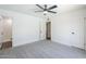 Bedroom includes neutral carpet, and a bathroom with a walk-in shower at 2337 E Contessa St, Mesa, AZ 85213