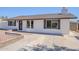 Single-story home with a brick trimmed walkway, bay window, and a well-manicured front yard at 2337 E Contessa St, Mesa, AZ 85213
