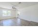 Bright living room featuring recessed lighting, hardwood floors, neutral paint, and plenty of natural light at 2337 E Contessa St, Mesa, AZ 85213