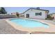 Backyard pool area with a well-maintained pool and updated deck at 2337 E Contessa St, Mesa, AZ 85213