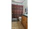 Bathroom featuring a shower, a toilet, tile flooring, and a vanity with drawers at 265 W 17Th Ave, Apache Junction, AZ 85120