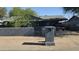 Charming home featuring a private front yard and a convenient carport at 265 W 17Th Ave, Apache Junction, AZ 85120