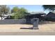 Charming home featuring a private front yard and a convenient carport at 265 W 17Th Ave, Apache Junction, AZ 85120
