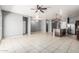 Open concept living space featuring tile floors and stainless steel appliances at 3112 N 303Rd Dr, Buckeye, AZ 85396