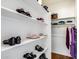 Walk-in closet featuring custom shelving and clothing racks at 31332 N 137Th Ln, Peoria, AZ 85383