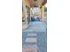 Spacious outdoor back patio with sliding doors and ceiling fan is perfect for relaxing or entertaining at 3247 E Lark Ct, Gilbert, AZ 85297