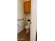A small bathroom featuring the commode, safety bar, and toilet paper dispenser at 3247 E Lark Ct, Gilbert, AZ 85297