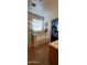 Bathroom with a separate shower and soaking tub next to an arched doorway leading to a bedroom at 3247 E Lark Ct, Gilbert, AZ 85297