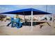 Community playground with slides, swings, and shade canopy for Gathering fun at 3247 E Lark Ct, Gilbert, AZ 85297