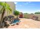 Inviting courtyard with a charming waterfall, stone pavers, lush plants, and seating at 32826 N 54Th St, Cave Creek, AZ 85331