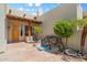 Charming courtyard featuring desert landscaping and a decorative fountain at 32826 N 54Th St, Cave Creek, AZ 85331