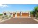 Home featuring desert landscaping and a multi-car garage at 32826 N 54Th St, Cave Creek, AZ 85331