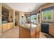 Spacious kitchen featuring granite island and tile flooring at 32826 N 54Th St, Cave Creek, AZ 85331