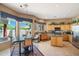 Eat-in kitchen with light wood cabinets, stainless appliances, and breakfast nook at 32826 N 54Th St, Cave Creek, AZ 85331