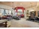 Spacious living room featuring large windows, ceiling fan and decorative arches at 32826 N 54Th St, Cave Creek, AZ 85331