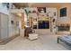Comfortable living room featuring a fireplace, entertainment center, and plush seating at 32826 N 54Th St, Cave Creek, AZ 85331