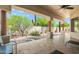 Covered patio offering a serene outdoor living space with views of the desert landscaping at 32826 N 54Th St, Cave Creek, AZ 85331
