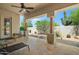 Covered patio offering a serene outdoor living space with views of the desert landscaping at 32826 N 54Th St, Cave Creek, AZ 85331