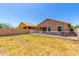 The large backyard of this home is fenced and private at 36538 W La Paz St, Maricopa, AZ 85138