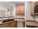 Eat-in kitchen offering lots of counter space and stainless steel appliances at 36538 W La Paz St, Maricopa, AZ 85138