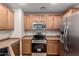 Well-equipped kitchen featuring stainless steel appliances and ample cabinet space at 36538 W La Paz St, Maricopa, AZ 85138