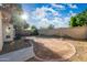 Exterior view of a home with a private backyard, patio area, and perimeter brickwork at 4016 W Royal Palm Rd, Phoenix, AZ 85051