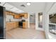 Bright kitchen features stainless steel appliances, knotty alder cabinets, and ample countertop space at 4016 W Royal Palm Rd, Phoenix, AZ 85051