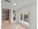 Bright living room has large windows that bring in an abundance of natural light at 4016 W Royal Palm Rd, Phoenix, AZ 85051