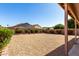 Large, low-maintenance backyard with mature landscaping and block fence, perfect for relaxing and entertaining at 4031 W Lone Cactus Dr, Glendale, AZ 85308