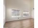 Spacious living room with high ceilings and wood-style flooring at 4031 W Lone Cactus Dr, Glendale, AZ 85308
